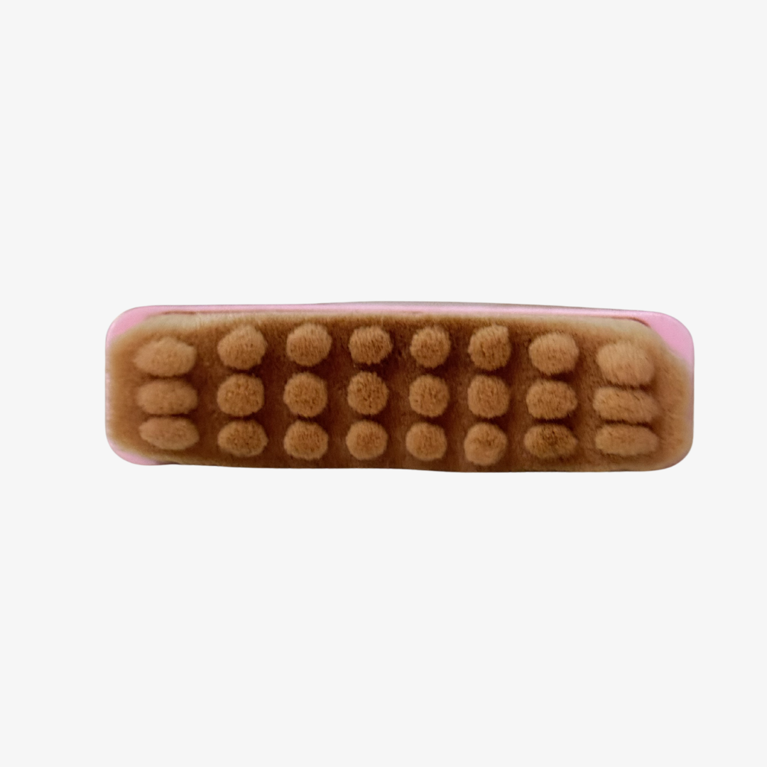 Close-up of a Face Dry Brush designed for skin stimulation and lymphatic flow, highlighting features for how to dry brush your face.